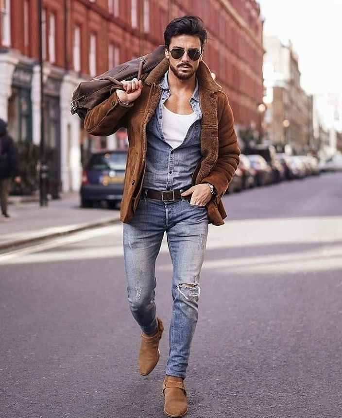 Fall outfit ideas for men, brown suede jacket over a denim over shirt with jeans 