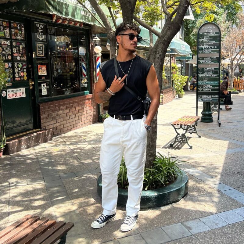 White pants with black top outfits for men.