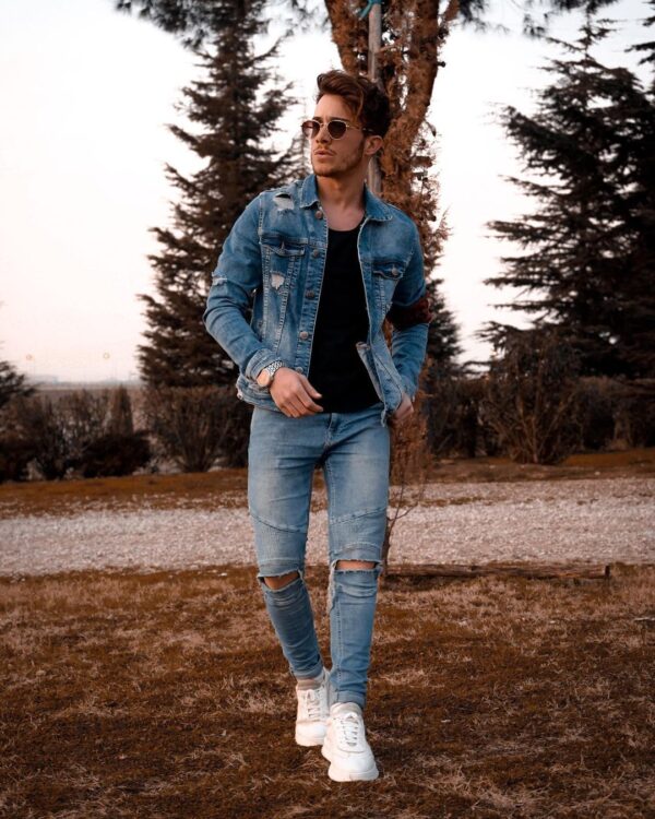 Ripped jeans and denim jacket outfit