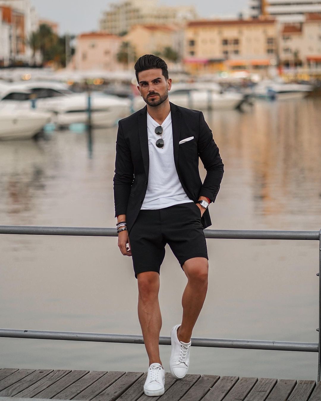 Black short suit with a tee and sneakers